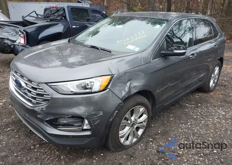 2022 Ford Edge Titanium z USA, uszkodzony, nr VIN 2FMPK4K90NBA35277